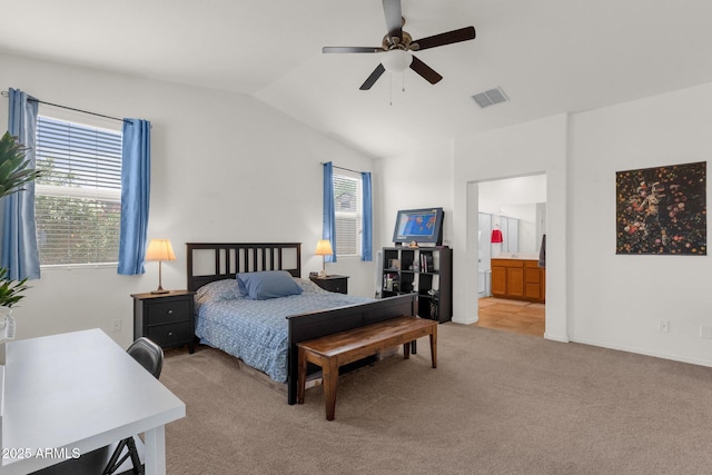 1725 E Chanute Pass, Phoenix, AZ 85040 - bedroom with light carpet, lofted ceiling, ensuite bath, and a ceiling fan