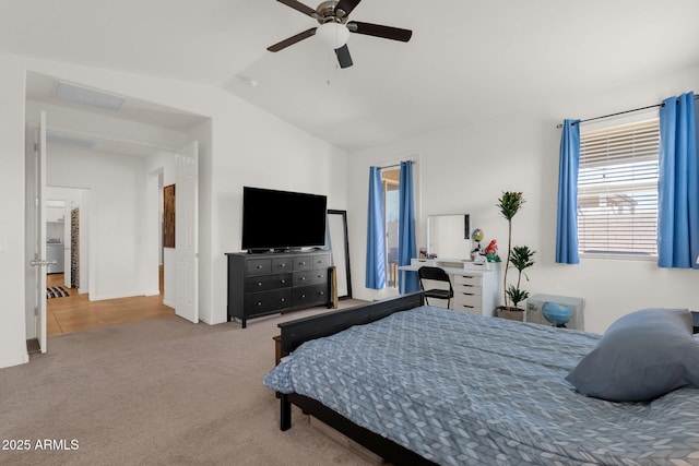 1725 E Chanute Pass, Phoenix, AZ 85040 - bedroom with vaulted ceiling, carpet floors, tile patterned floors, ceiling fan, and baseboards