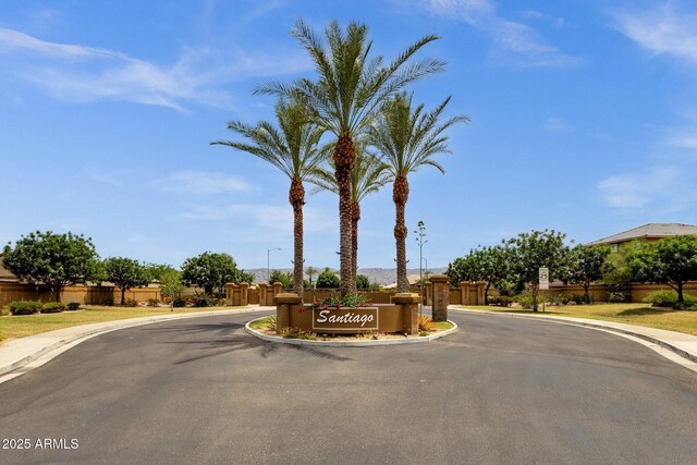 1725 E Chanute Pass, Phoenix, AZ 85040 - view of asphalt street with curbs, sidewalks, and street lights