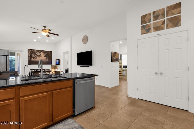 1725 E Chanute Pass, Phoenix, AZ 85040 - kitchen with stainless steel dishwasher, a sink, a ceiling fan, brown cabinetry, and open floor plan