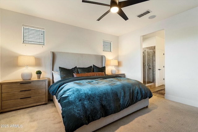 27203 N 78th Ln, Peoria, AZ 85383 - bedroom with baseboards, light carpet, ensuite bath, visible vents, and ceiling fan