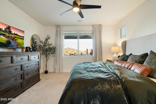 27203 N 78th Ln, Peoria, AZ 85383 - bedroom featuring light carpet, baseboards, and a ceiling fan