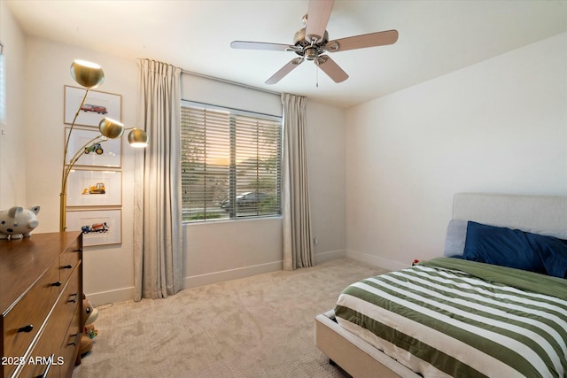 27203 N 78th Ln, Peoria, AZ 85383 - bedroom with baseboards, a ceiling fan, and light carpet