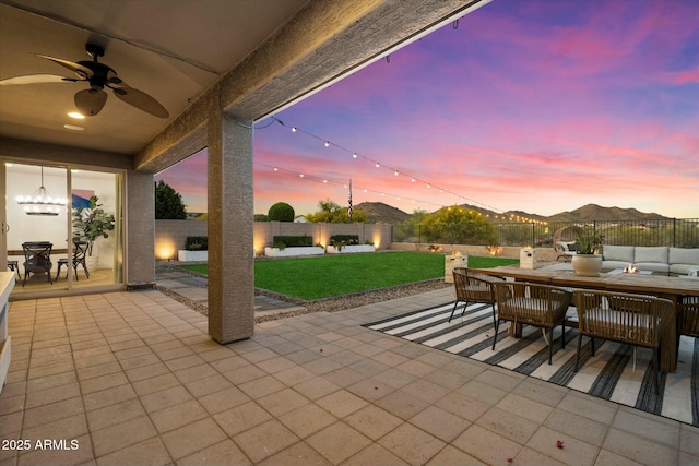 27203 N 78th Ln, Peoria, AZ 85383 - view of patio / terrace with a ceiling fan, outdoor lounge area, a fenced backyard, and outdoor dining area