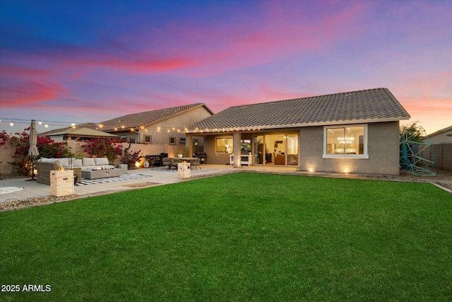 27203 N 78th Ln, Peoria, AZ 85383 - back of house with a tiled roof, a lawn, an outdoor living space, fence, and a patio