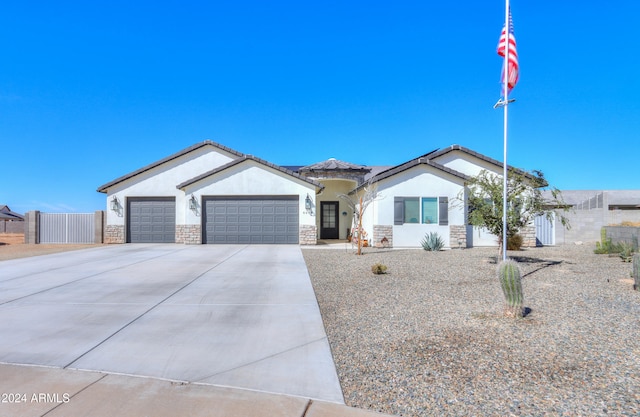 ranch-style home with a garage