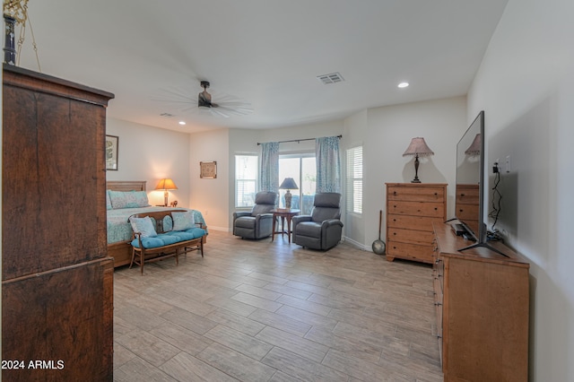 bedroom featuring light wood-type flooring and ceiling fan