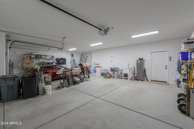 garage featuring a garage door opener