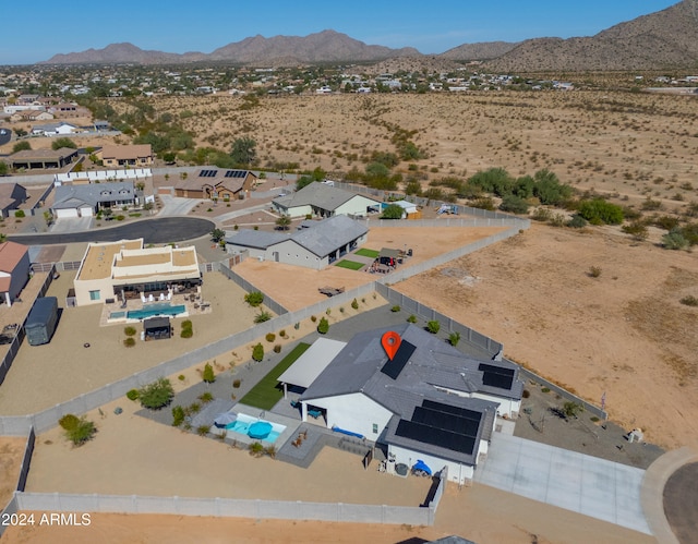 drone / aerial view featuring a mountain view