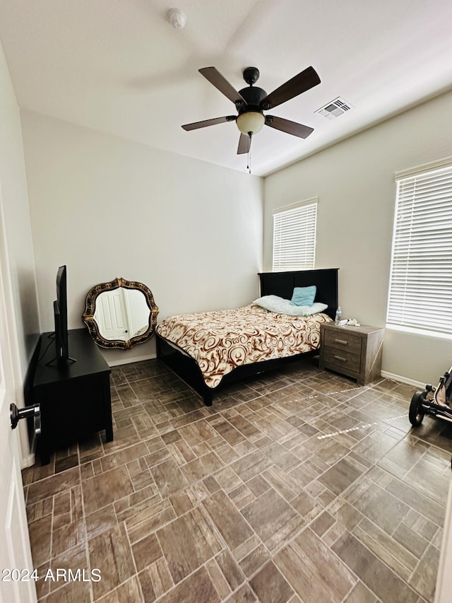 bedroom featuring ceiling fan