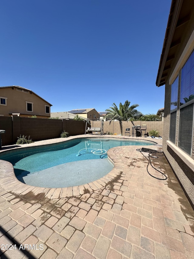 view of pool with a patio