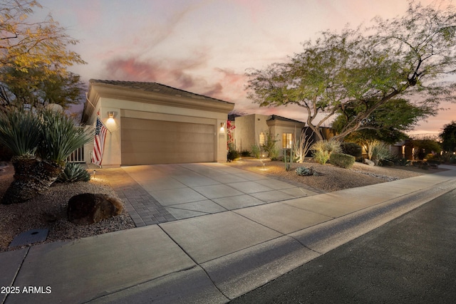 view of front of property with a garage