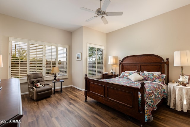 bedroom with dark hardwood / wood-style floors and ceiling fan