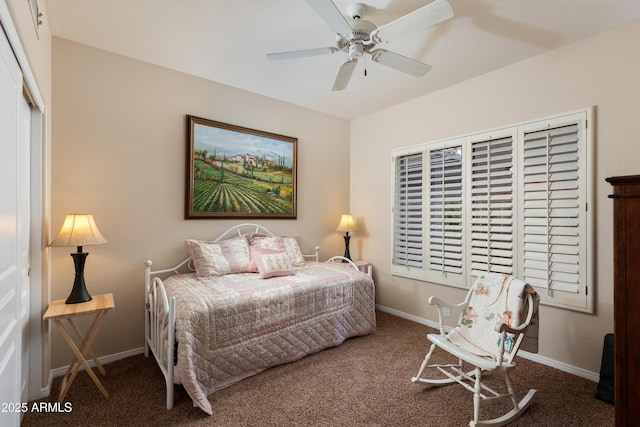 bedroom featuring carpet floors, ceiling fan, and a closet