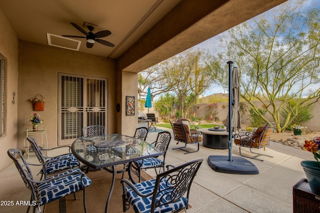 view of patio with ceiling fan