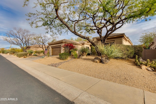 view of front of property with a garage