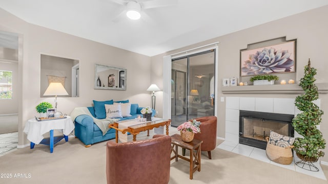 15252 N 100th St Unit 1164, Scottsdale, AZ 85260 - carpeted living area with a ceiling fan and a tiled fireplace