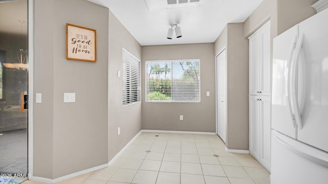 15252 N 100th St Unit 1164, Scottsdale, AZ 85260 - entryway featuring baseboards and light tile patterned flooring