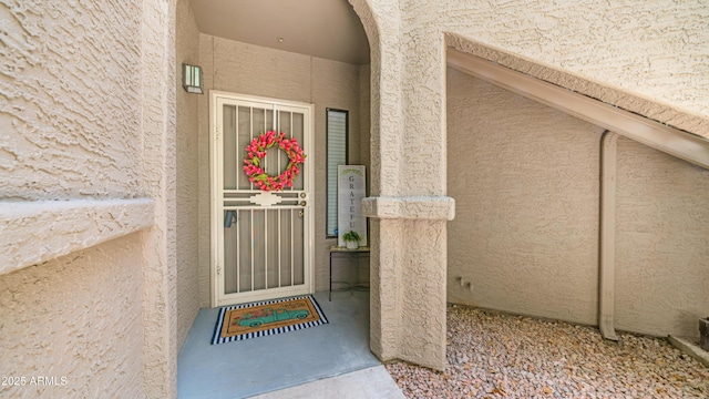 15252 N 100th St Unit 1164, Scottsdale, AZ 85260 - view of exterior entry with stucco siding
