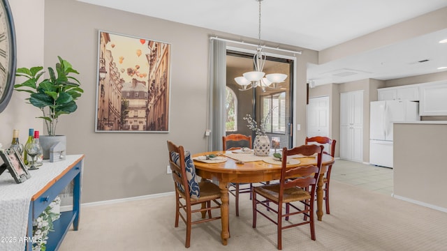 15252 N 100th St Unit 1164, Scottsdale, AZ 85260 - dining room featuring light colored carpet and a chandelier