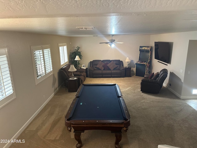 rec room featuring billiards, ceiling fan, carpet floors, and a textured ceiling