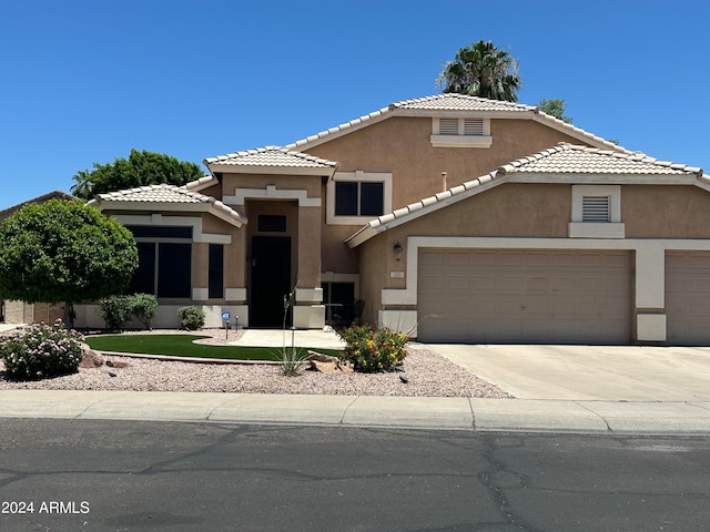 view of front of property featuring a garage