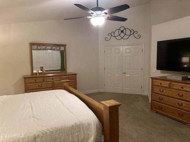 bedroom with ceiling fan, a closet, and carpet