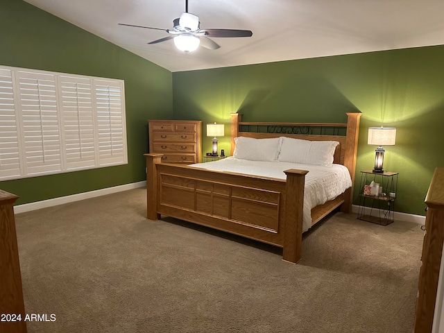 carpeted bedroom featuring ceiling fan and lofted ceiling