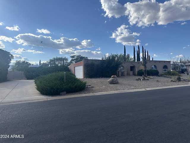 view of property exterior featuring a garage