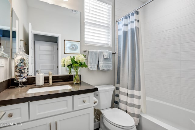 full bath with toilet, vanity, and shower / tub combo with curtain