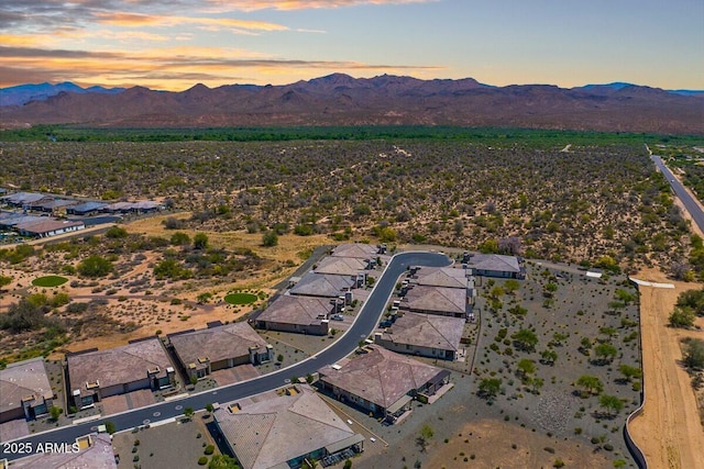 aerial view at dusk of a mountain view and view of desert landscape