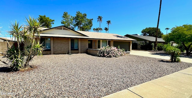 single story home with a garage