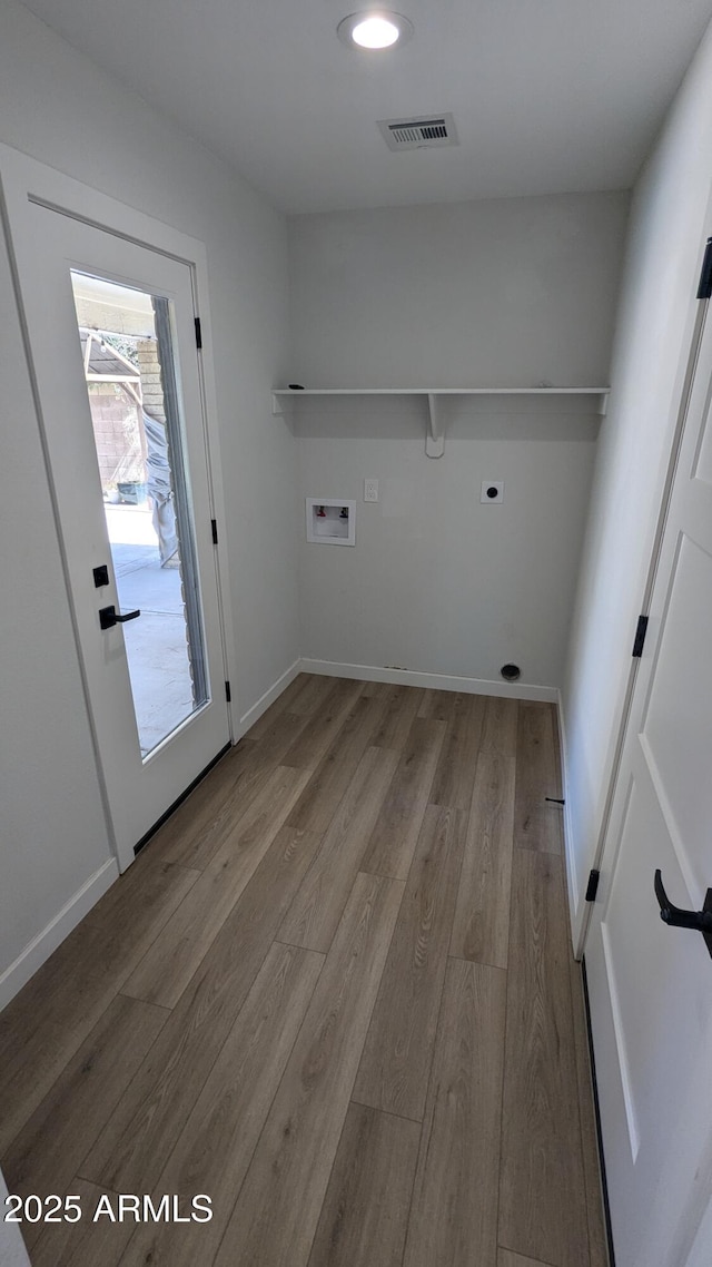 4442 E Aire Libre Ave, Phoenix, AZ 85032 - laundry area with wood finished floors, washer hookup, electric dryer hookup, and recessed lighting
