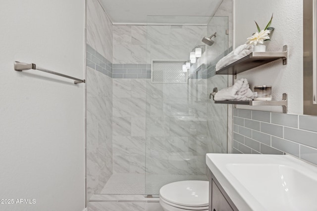 full bathroom with tile walls, vanity, toilet, and a walk in shower