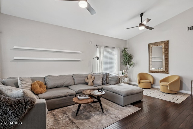 living area featuring dark wood finished floors, visible vents, vaulted ceiling, ceiling fan, and baseboards