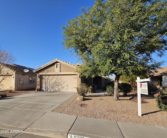 view of front of home with a garage