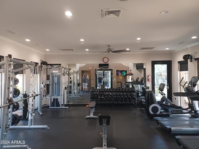 exercise room featuring ceiling fan and crown molding