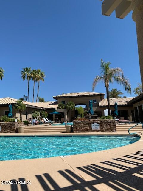 view of pool featuring a patio area