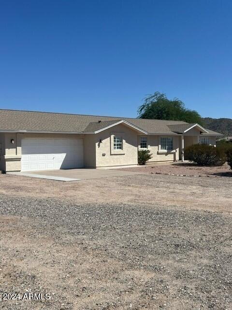 ranch-style house with a garage