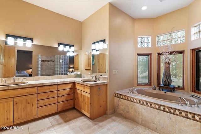 bathroom featuring tile patterned flooring and vanity