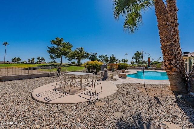 view of pool with a patio area