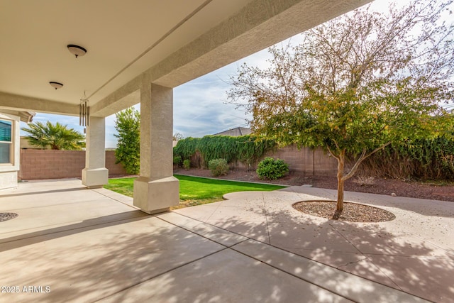 view of patio with a fenced backyard