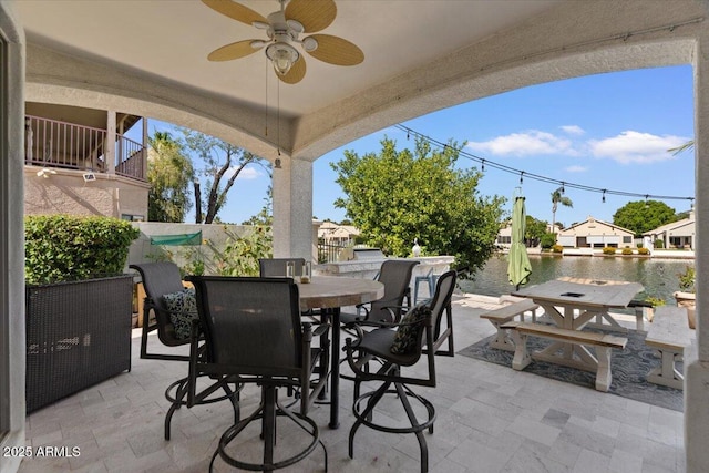 2135 E Clipper Ln, Gilbert, AZ 85234 - view of patio with outdoor dining space, ceiling fan, and a water view