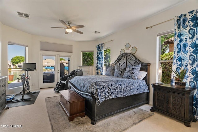 2135 E Clipper Ln, Gilbert, AZ 85234 - bedroom featuring access to exterior, light colored carpet, multiple windows, and ceiling fan