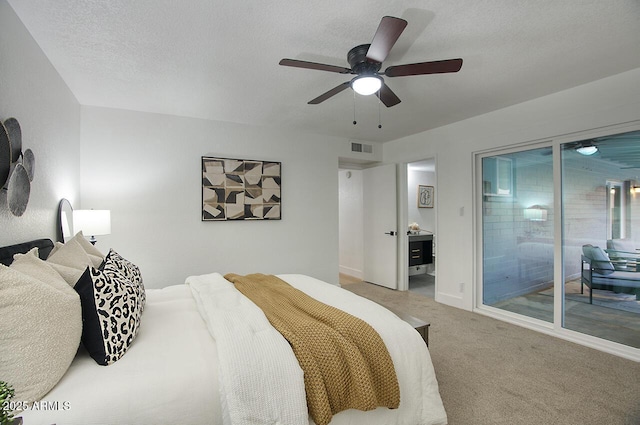 bedroom with ceiling fan, a textured ceiling, access to outside, and carpet flooring