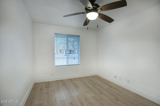 spare room with light hardwood / wood-style floors