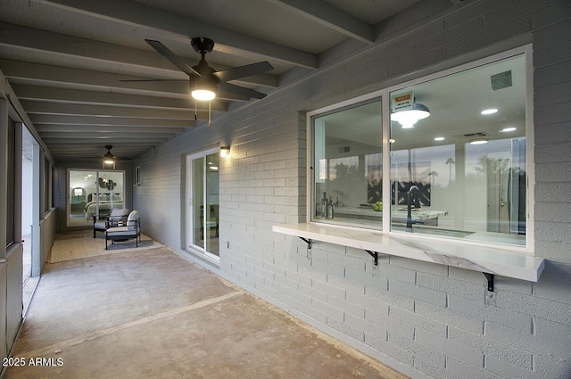 view of patio with ceiling fan