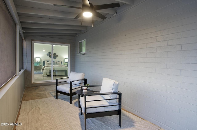 sunroom with beamed ceiling