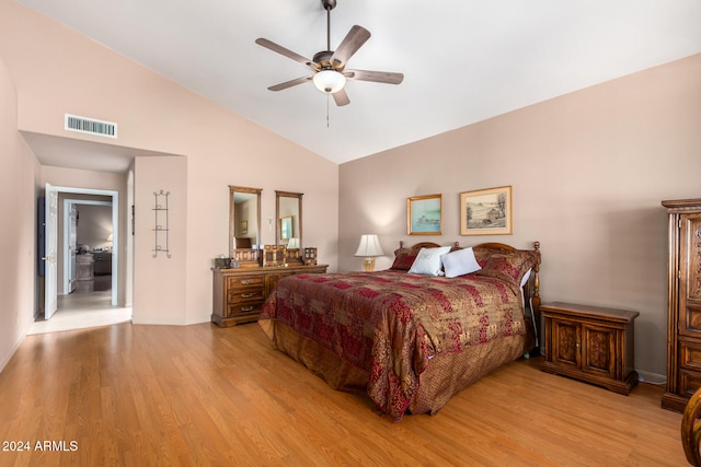 bedroom with light hardwood / wood-style floors, high vaulted ceiling, and ceiling fan