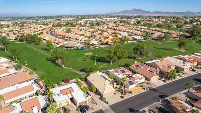 birds eye view of property featuring a mountain view